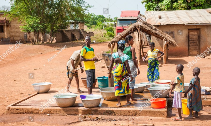 stock-photo-porto-novo-benin-mar-unidentified-people-and-children-get-water-from-the-well-people-180952460
